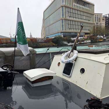 Jonge Jan on canal in winter sleet