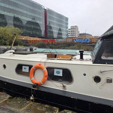 Jonge Jan on canal in winter sleet