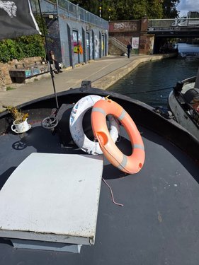 Jonge Jan with lifebuoys on canal
